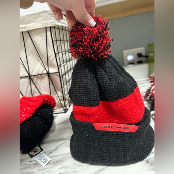 Nike- Team Canada Black and red winter hat with removable poof. - Picture 3 of 3